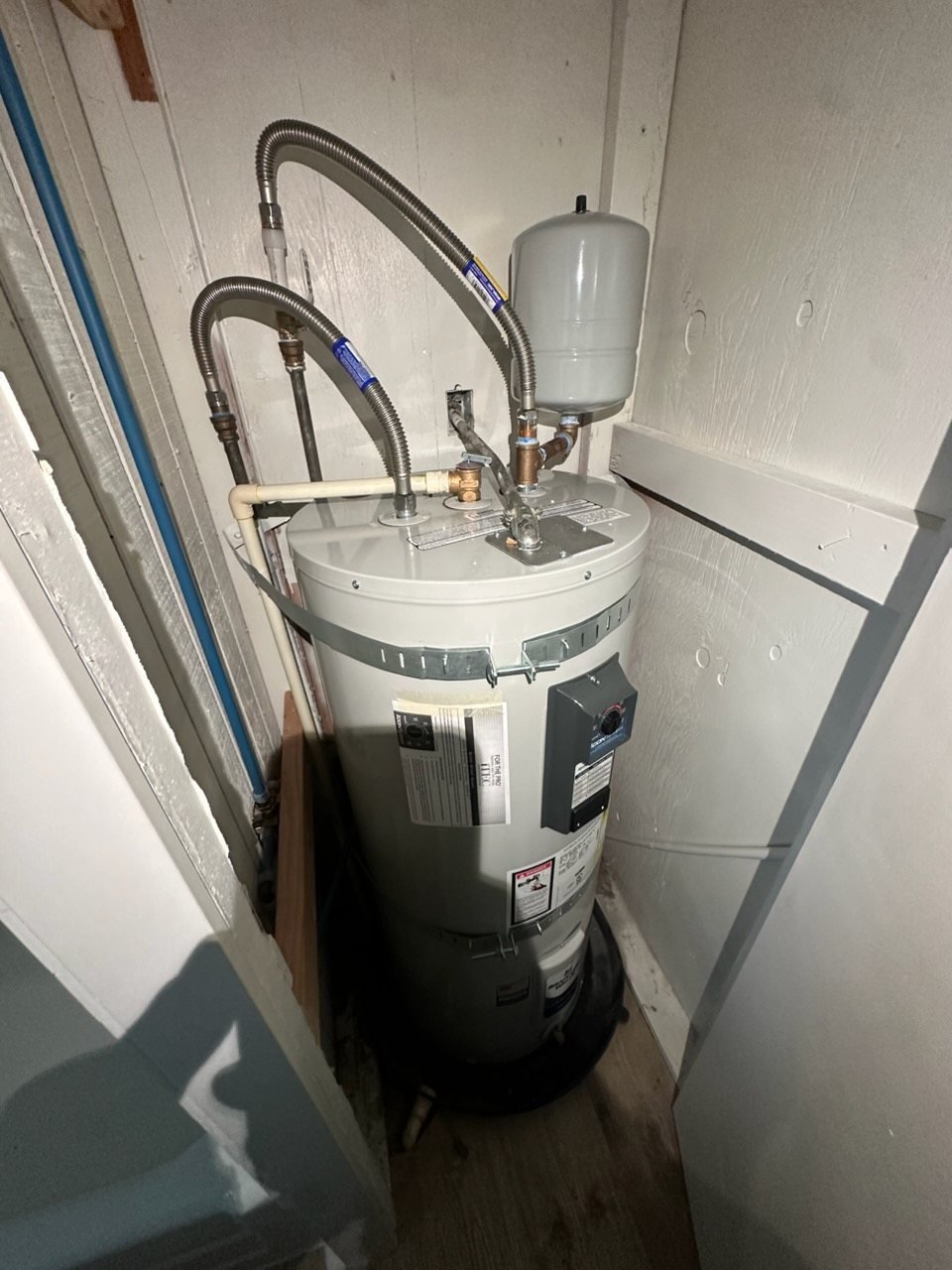 Electric tank water heater installed by Jeremy's Plumbing